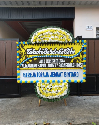 Papan Bunga Duka di Bataraguru